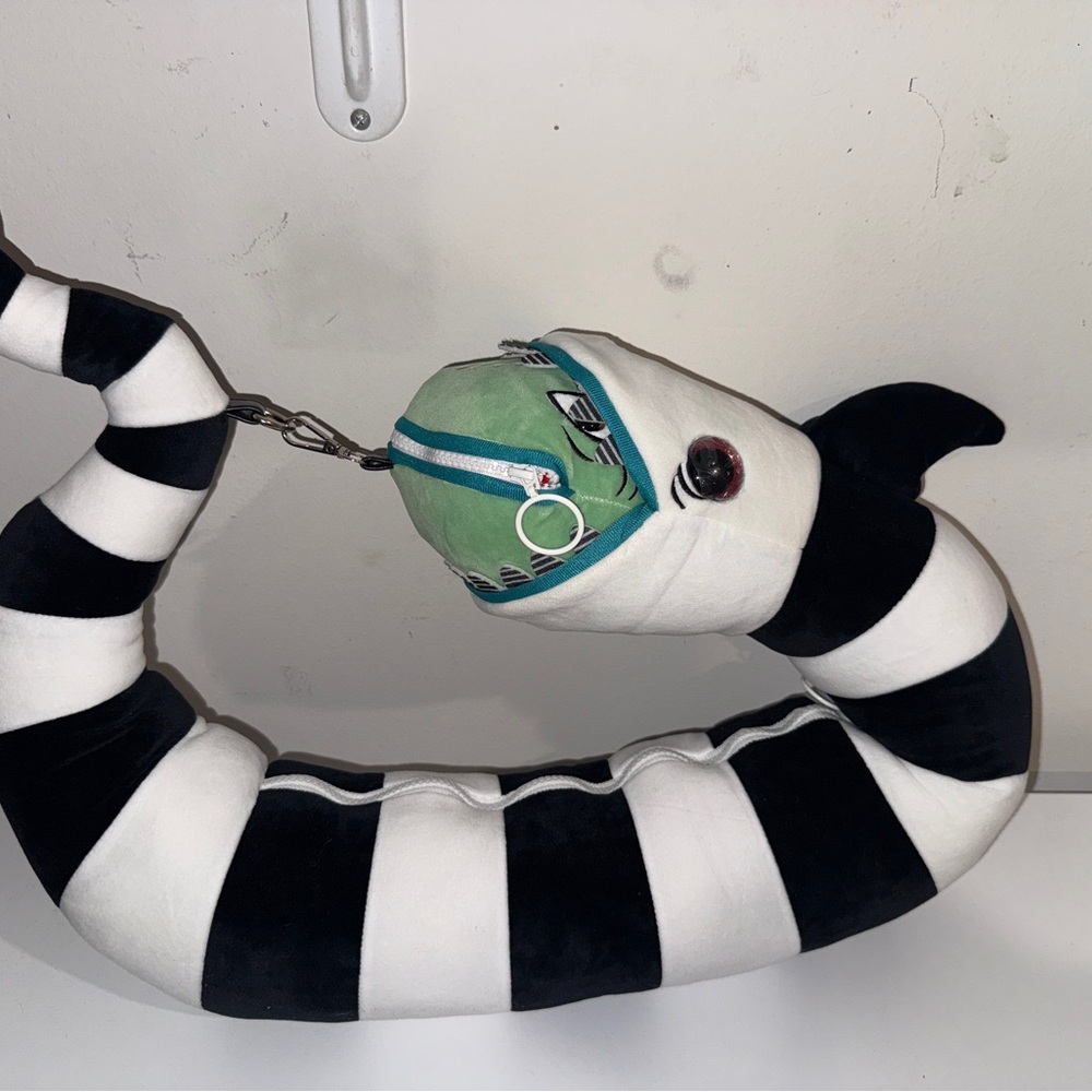 Dolls Kill Black and White Striped Snake Crossbody Bag